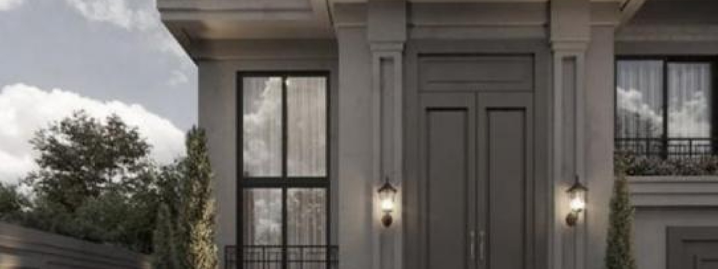 Large sliding door and window facade on a completed building